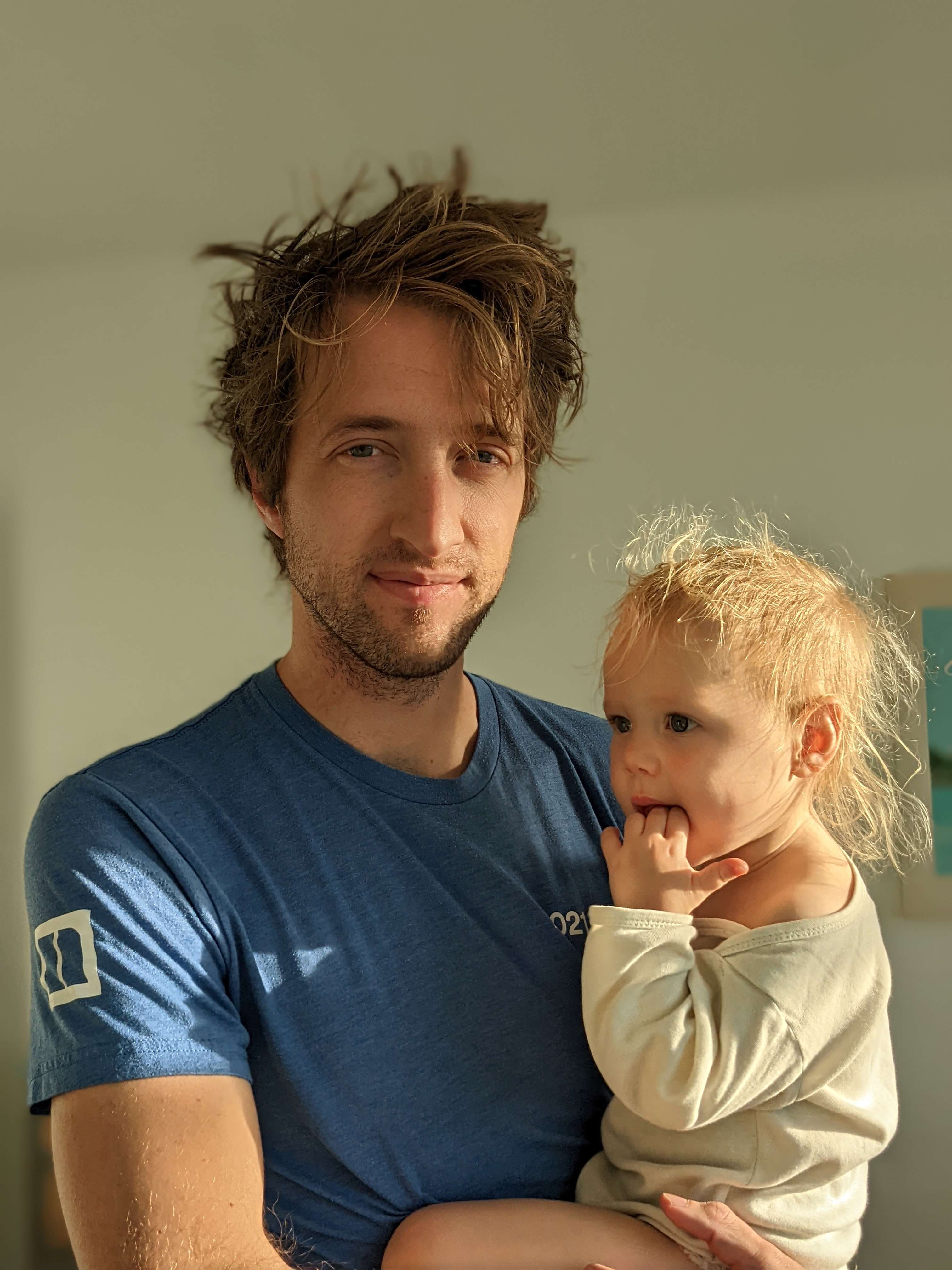 Fatehr and daughter both have bed head and look confussed