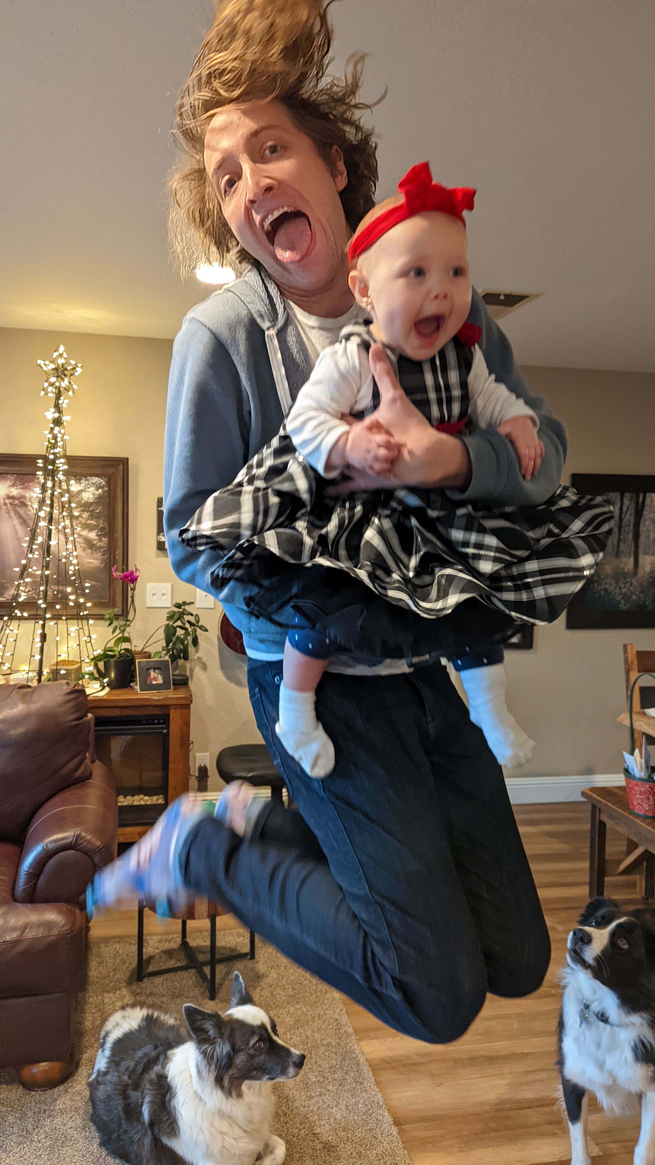 Man in sunglasses with smiling woman and baby